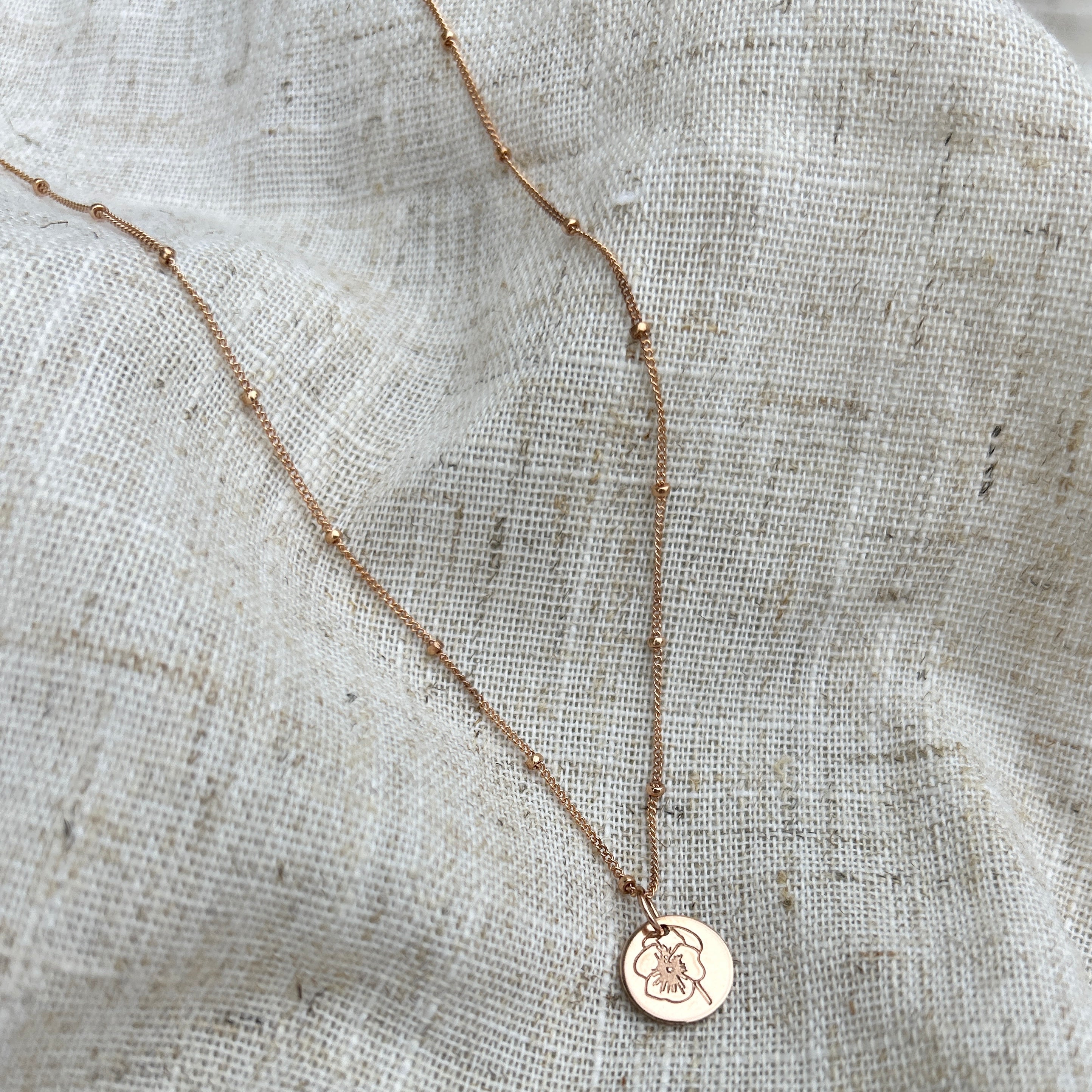 Rose Gold Knotted Necklace With Birth Flower Pendant