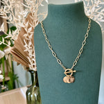Birth flower pendants on a paperclip chain with a toggle clasp