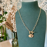 Birth flower pendants on a paperclip chain with a toggle clasp