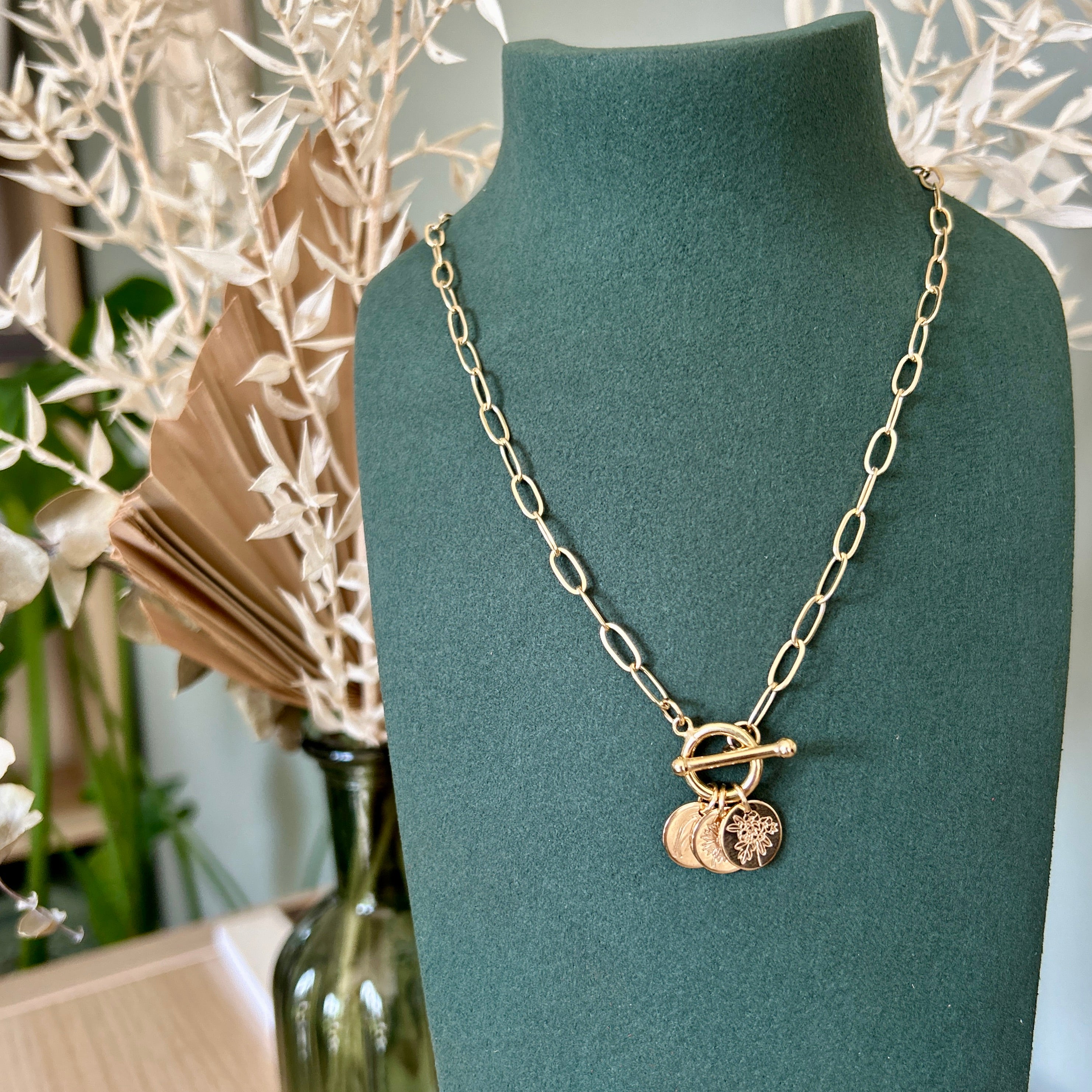 Birth flower pendants on a paperclip chain with a toggle clasp