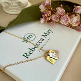 Gold filled necklace with engraved name tags.