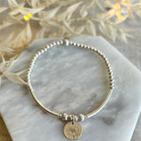 Sterling Silver Beaded Bracelet with Birth Month Flower Pendant