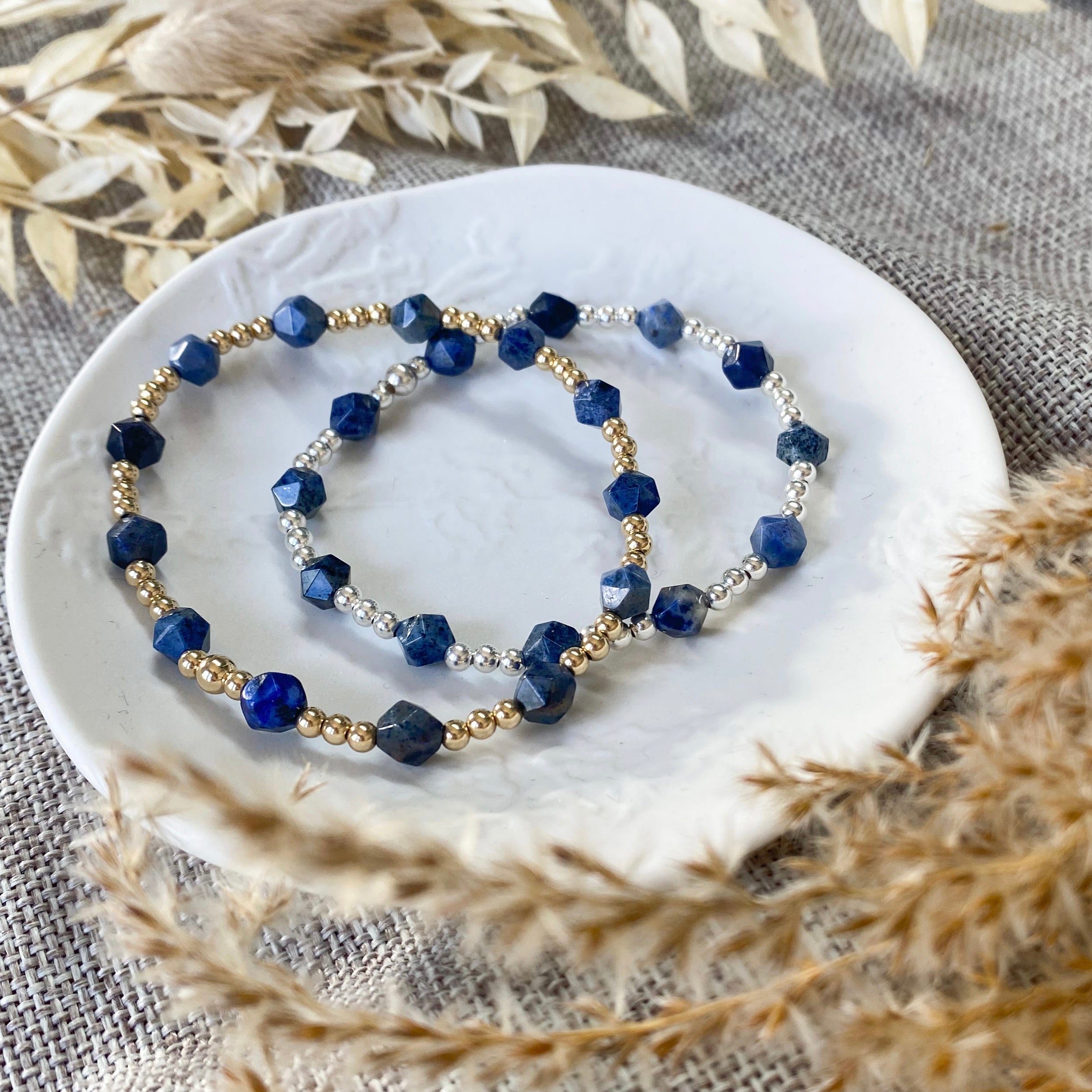 Blue sapphire gold filled and sterling silver stacking bracelets.