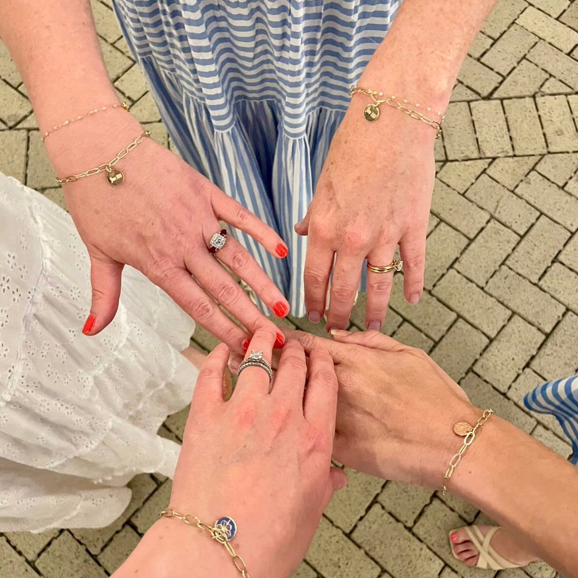 Four gold filled forget me not friendship bracelets made by Rebecca May Jewellery