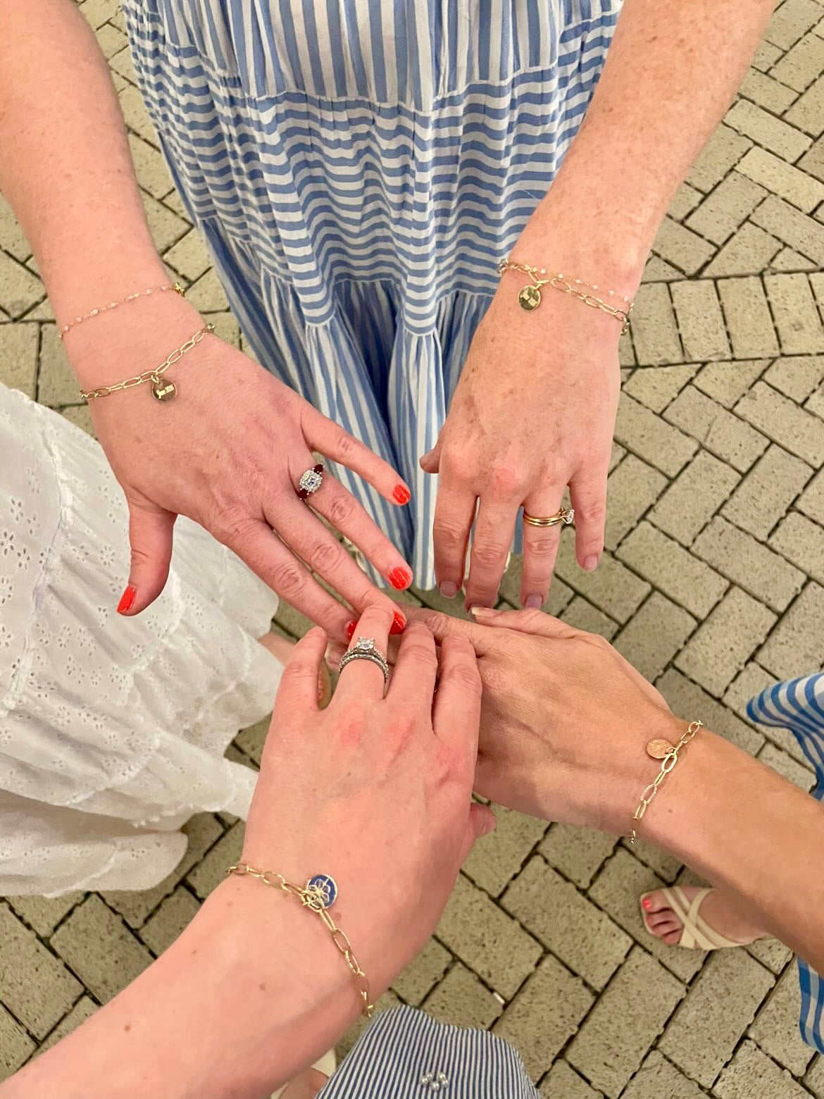 Four gold filled forget me not friendship bracelets made by Rebecca May Jewellery