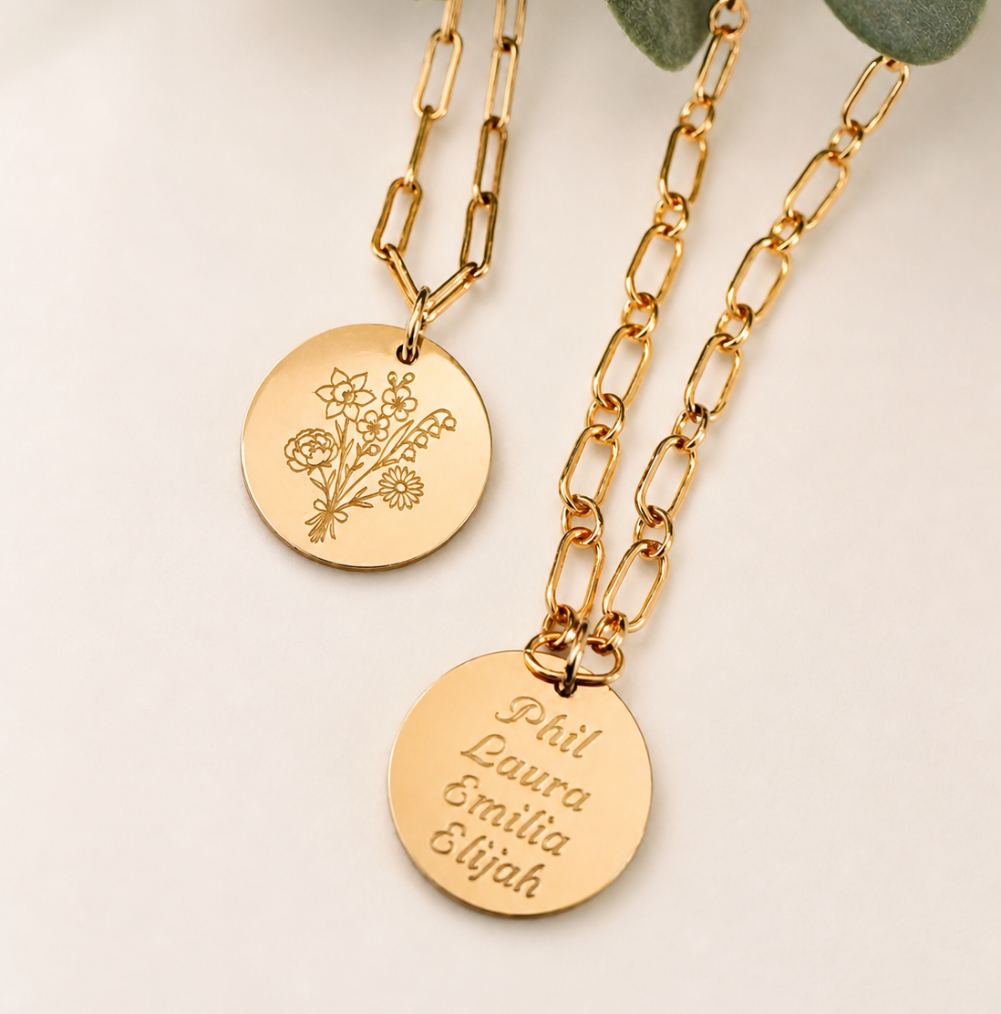 Gold filled engraved family birth flower bouquet with peony, daffodil, cherry blossom, lily of the valley and daisy. Engraved names on the reverse of charm