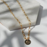 Gold filled necklace chain with botanical poppy birth flower hand stamped pendant.