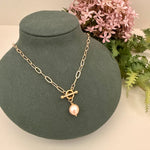 Handmade gold filled freshwater pearl toggle clasp necklace on a paperclip chain