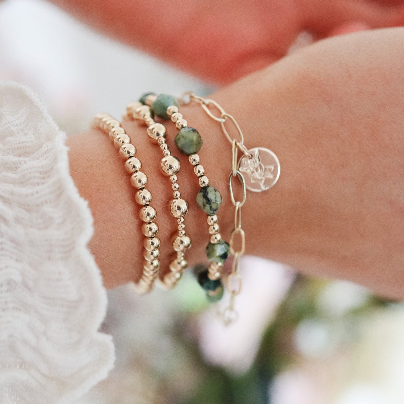Gold filled birthstone bracelet. Emerald birthstone and birth flower bracelets.