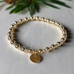 Mix metal birth flower bracelet with gold filled and sterling silver beads and birth flower pendant