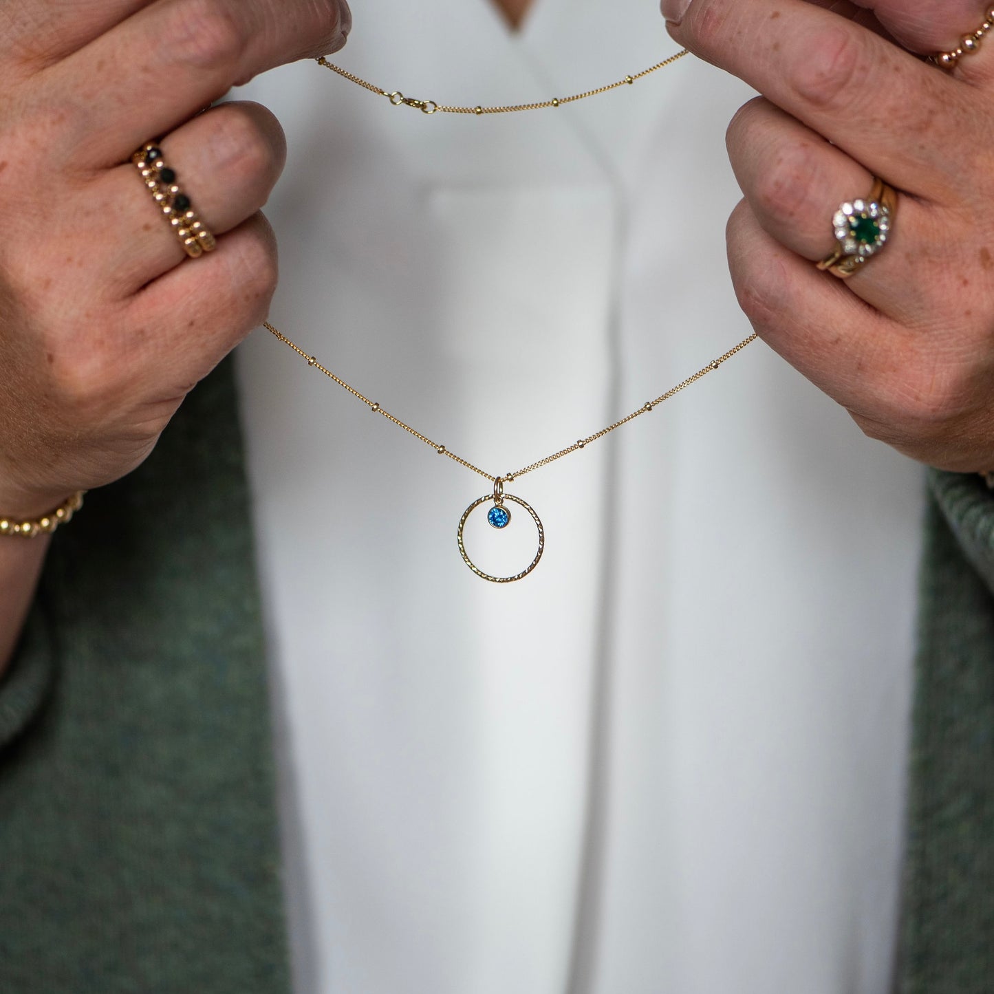 Birthstone necklace with December Birthstone on a gold filled knotted chain